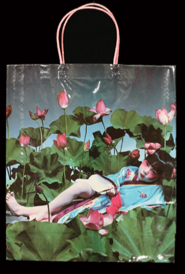 Shopping bag with child and lotus design