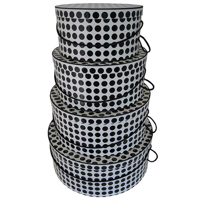 nested round hat boxes, black and white polka dots
