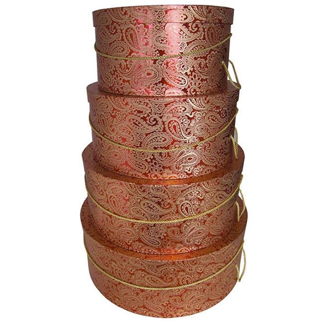 nested hat boxes red and golden paisley print pattern